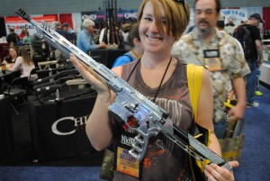 A nice attendee agreed to pose with the rifle. If it had been the sales rep, no one would have noticed the gun.